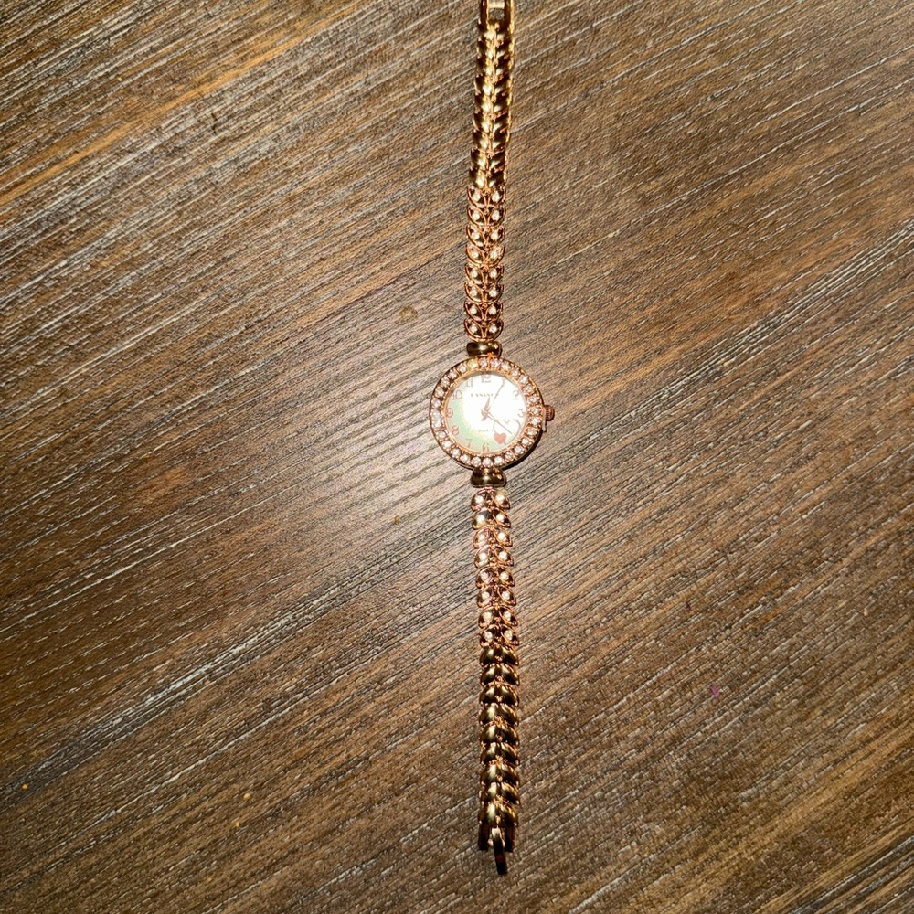 Elegant Gold-Tone Watch with Crystal Accents